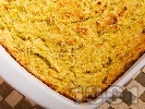 Рецепта Огретен от настъргани / рендосани тиквички със сирене, яйца и грис запечен на фурна
